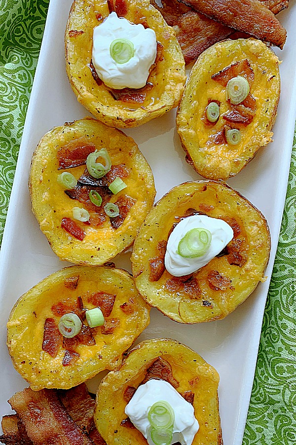 six air fryer potato skins on a platter