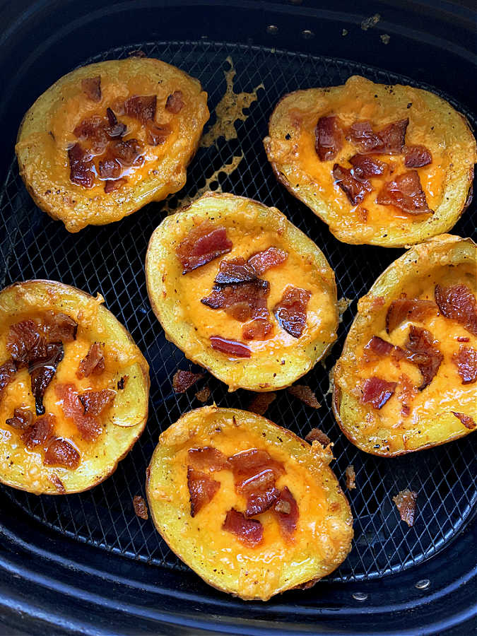 filled potato skins, freshly fried in the air fryer basket