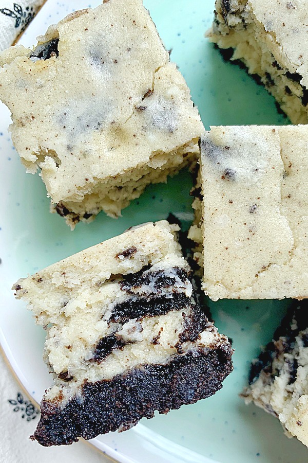 side view of oreo cheesecake bites on a plate