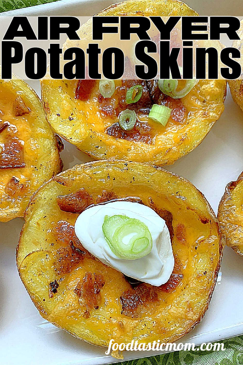 These Air Fryer Potato Skins are even better than restaurant skins. Start in the microwave and brush with bacon fat - then the air fryer makes them perfect! via @foodtasticmom