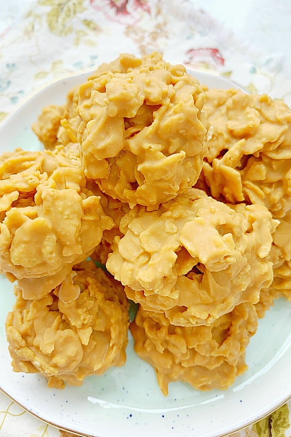 close up view of peanut butter cornflake cookies on plate