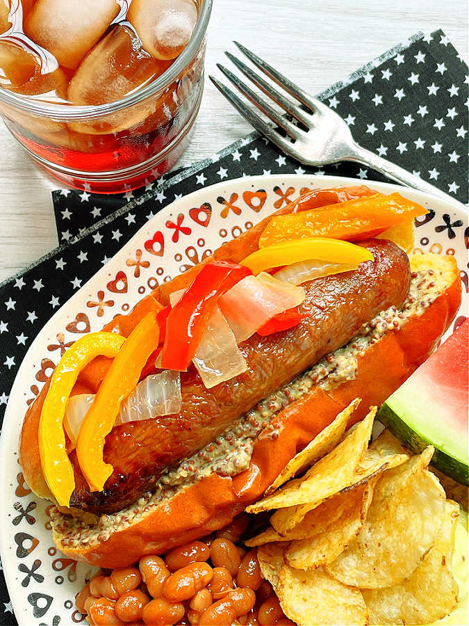 air fryer sausage plated with picnic sides