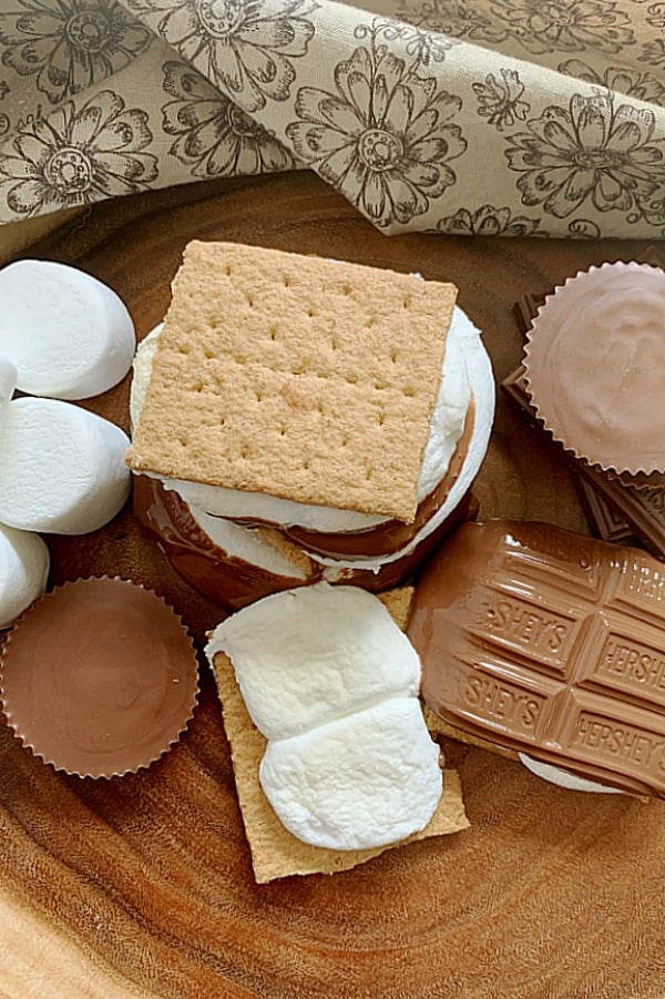 looking down on a platter of three air fryer s'mores