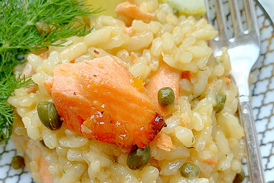 portrait view of salmon risotto on a plate
