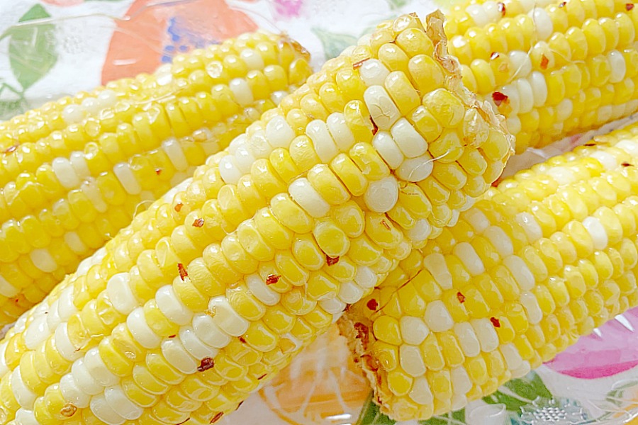 a fresh ear of corn cooked in the air fryer