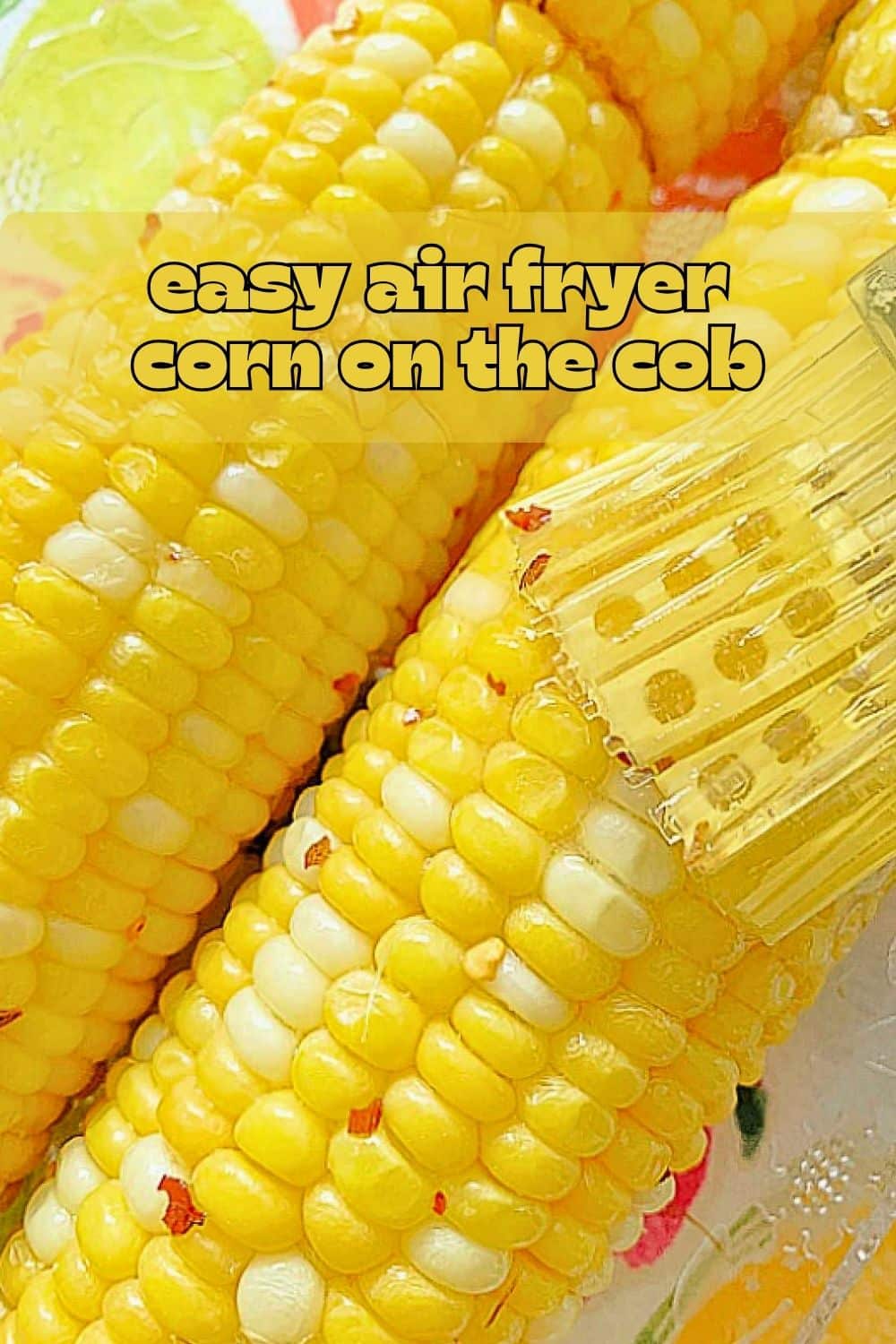 Air Fryer Corn on the Cob is ridiculously delicious - the air fryer seals in the corn's natural flavor. Brushed with honey butter, it is the ultimate summer treat. via @foodtasticmom