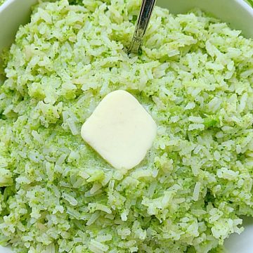 broccoli rice in a bowl topped with butter