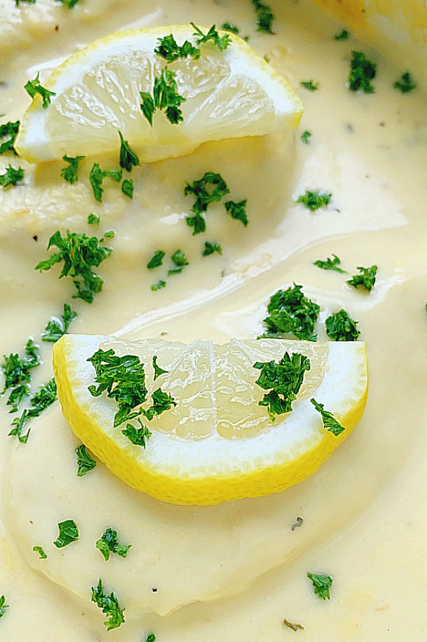 creamy lemon chicken after being baked in a casserole dish