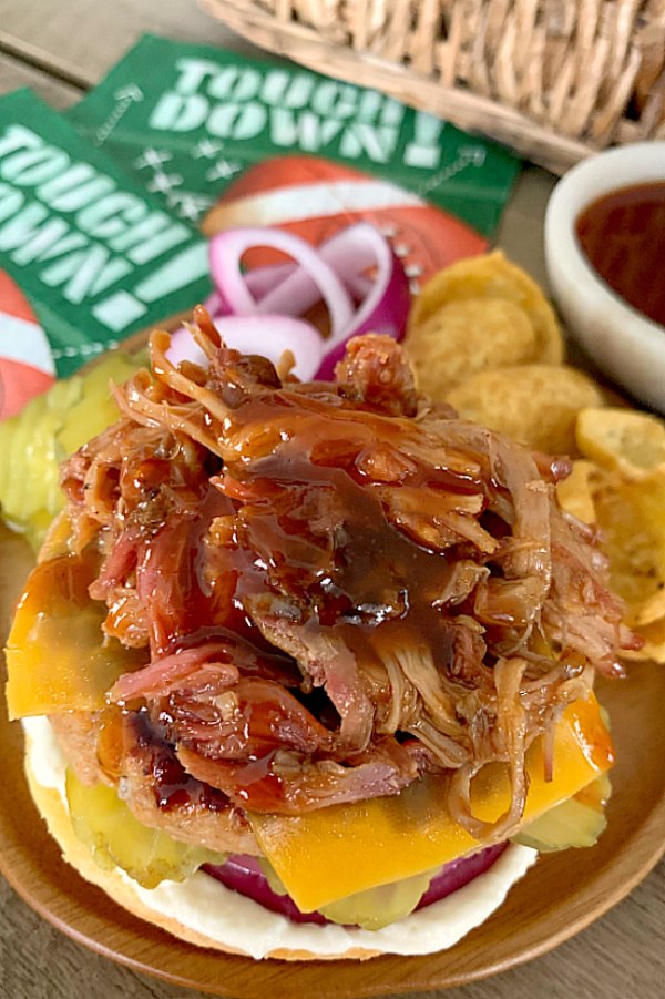 bbq pulled pork on top of pork burger