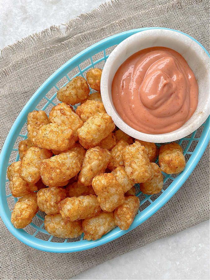 overhead view tater tots in a basket