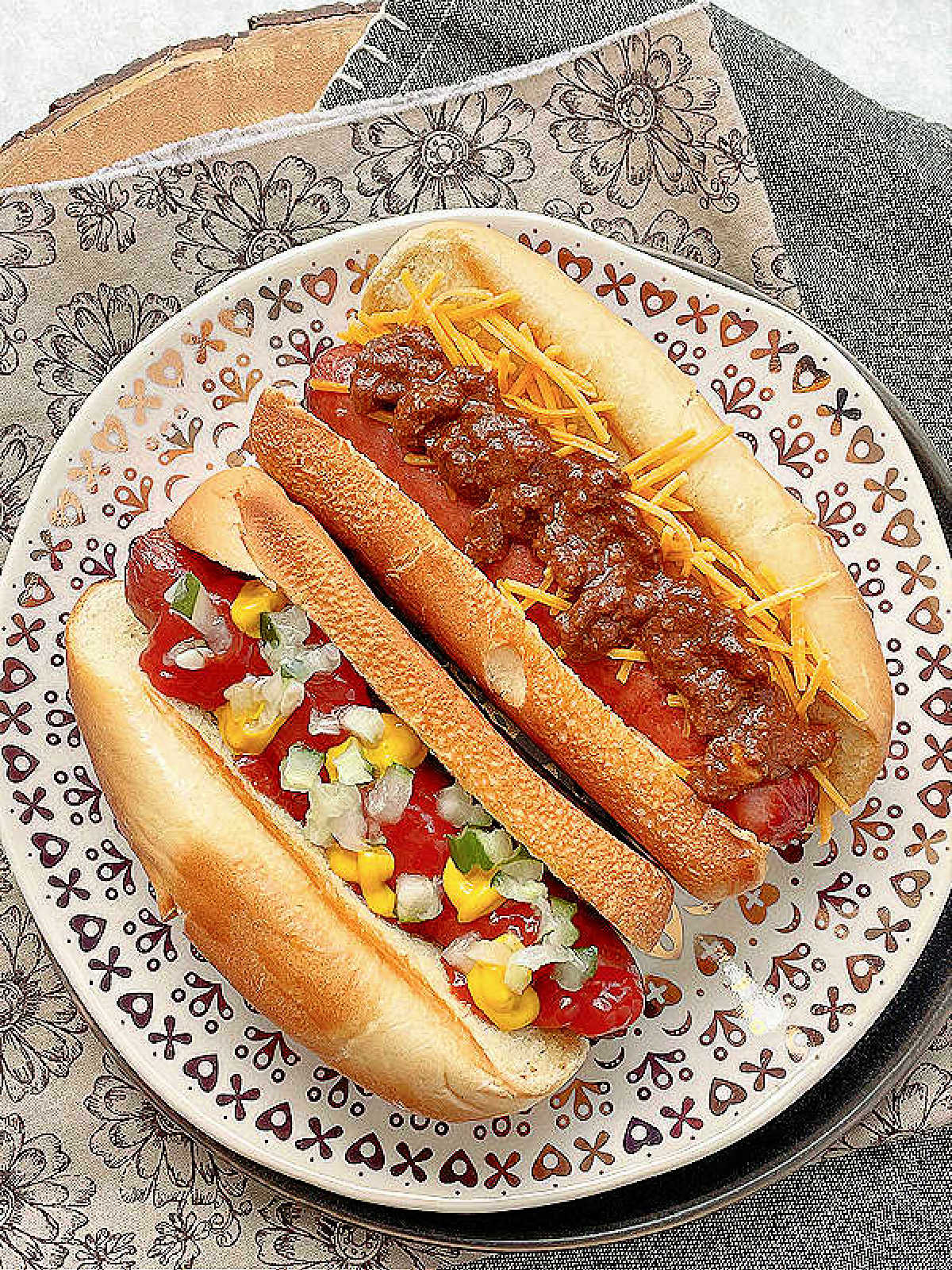 two air fryer hot dogs in toasted buttery buns