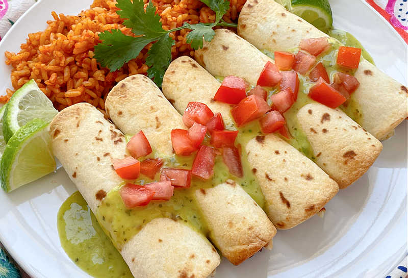 horizontal crop of air fryer taquitos on a plate