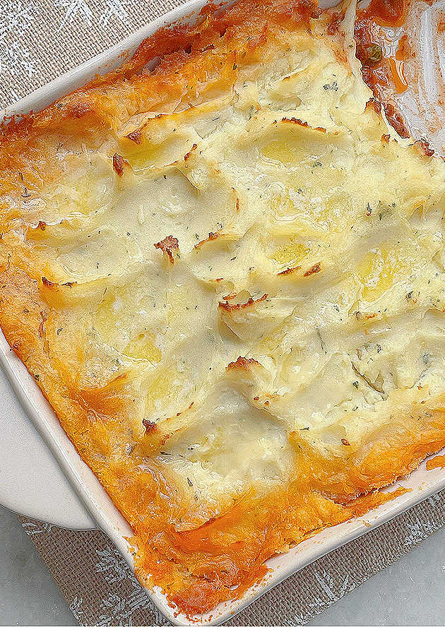 top of potato crust in casserole dish