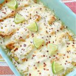 enchiladas in the baking dish topped with lime slices