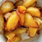 taking a bite of air fryer apples