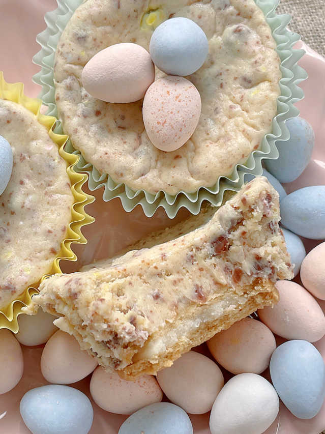 taking a bite of a mini egg cheesecake