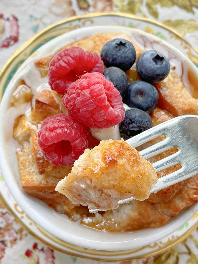 taking a bite of air fryer french toast