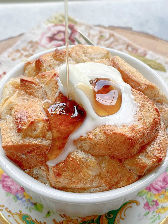 pouring maple syrup over air fryer french toast