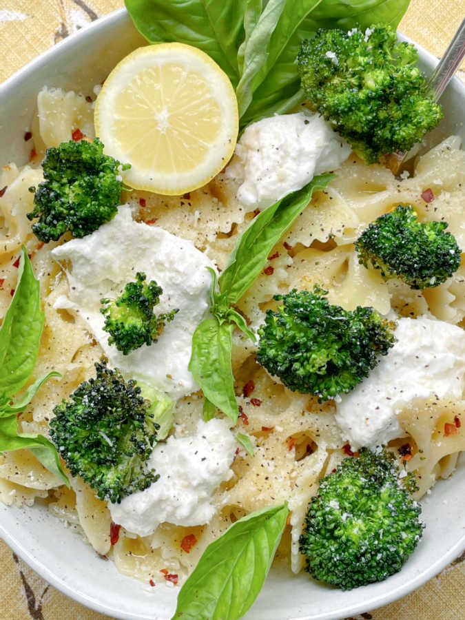 pasta topped with burrata cheese and air fryer broccoli