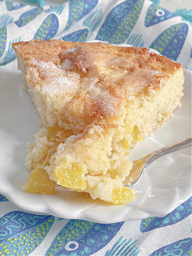 taking a bite of french pineapple cake