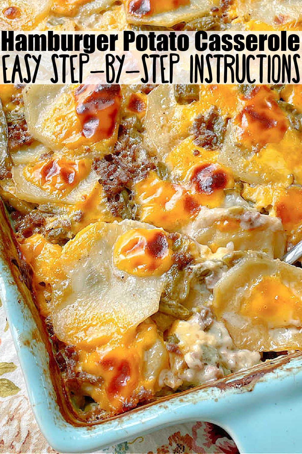 Hamburger Potato Casserole combines potatoes with ground beef and green beans in a velvety cheese sauce. It is pure comfort food.  via @foodtasticmom