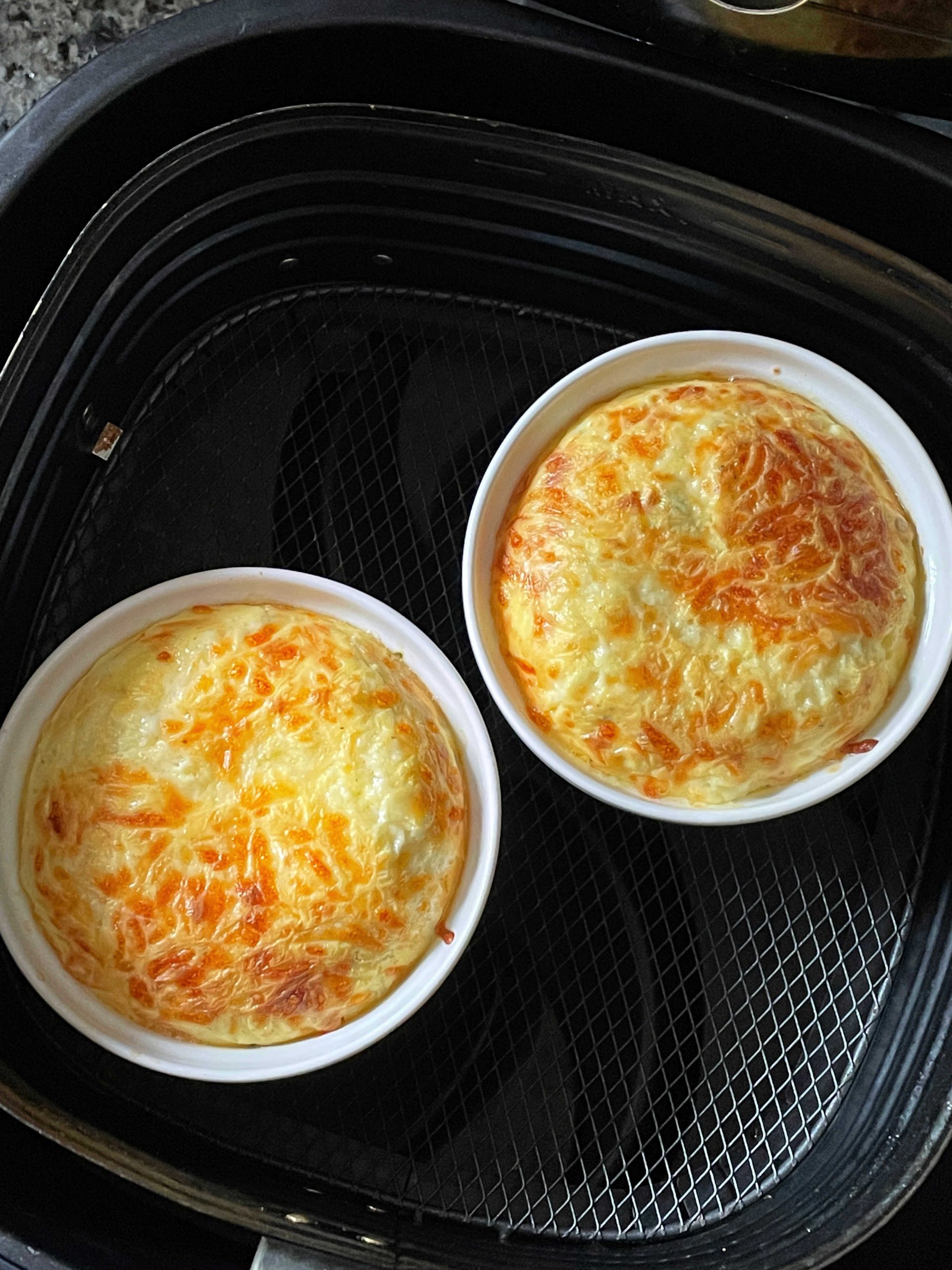 cooked quiche in the air fryer basket