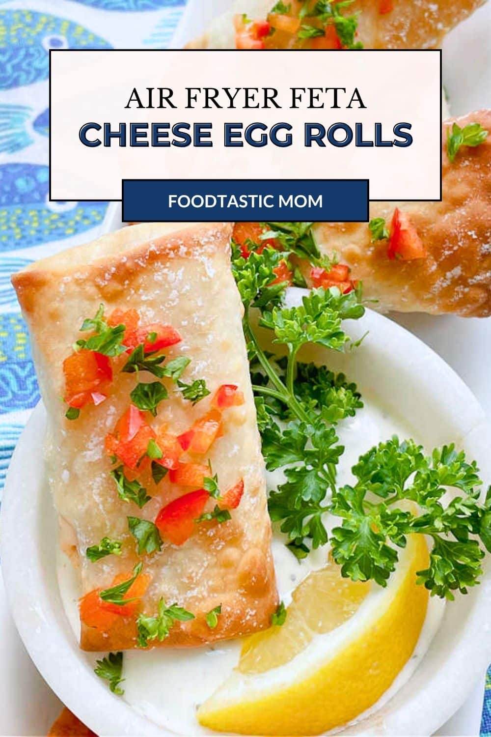 Air Fryer Feta Cheese Rolls are delightfully crispy egg rolls wrappers with red pepper, feta cheese, herbs and spices. Simply delicious. via @foodtasticmom