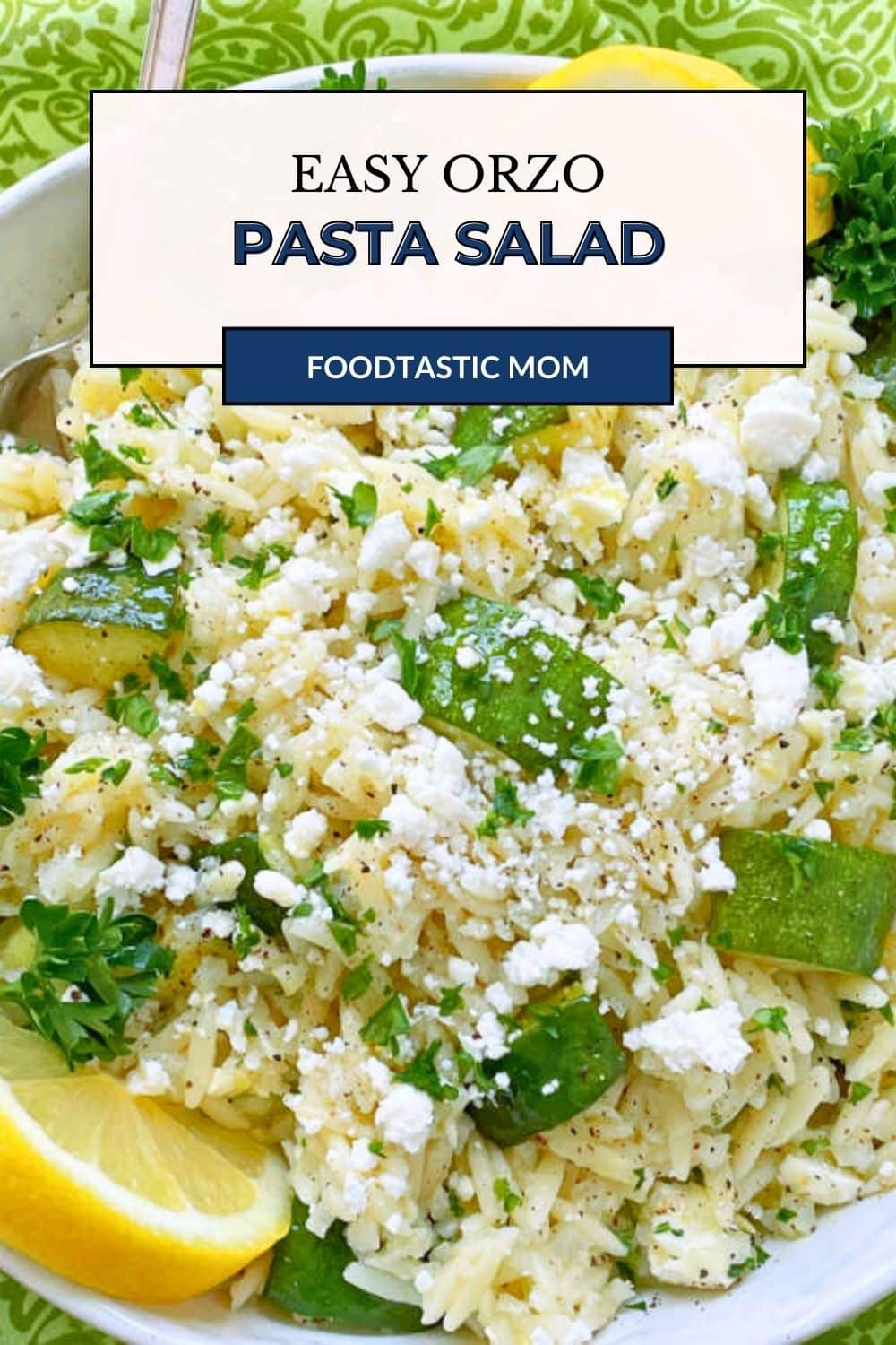 This Orzo Pasta Salad mixes both orzo pasta and cauliflower rice for a lower calorie salad. This salad does not soak up all the dressing in the fridge. via @foodtasticmom