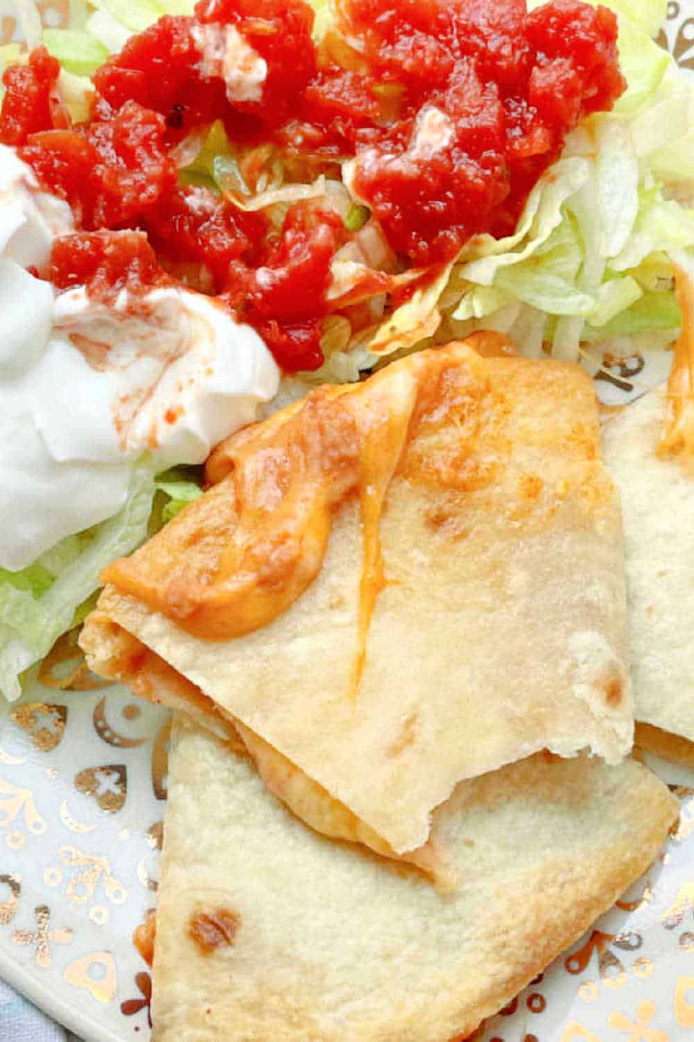 Make crispy cheese quesadillas in the air fryer to serve with your favorite toppings when you crave a comforting quick meal. via @foodtasticmom