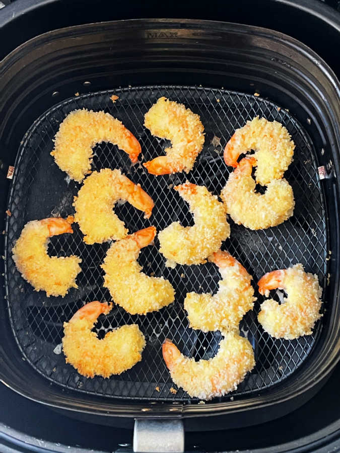 air fried bang bang shrimp in the air fryer basket