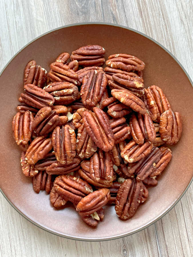 air fryer pecans on a plate