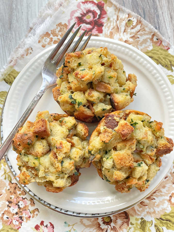 three stuffing muffins on a plate