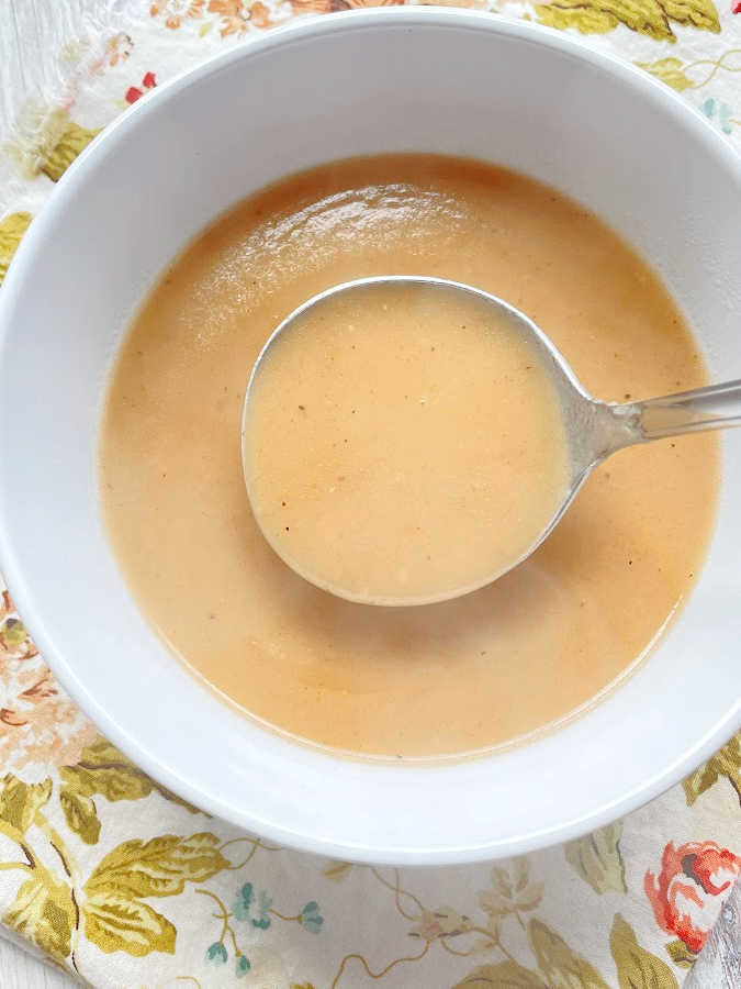 homemade turkey gravy to top the stuffing muffins