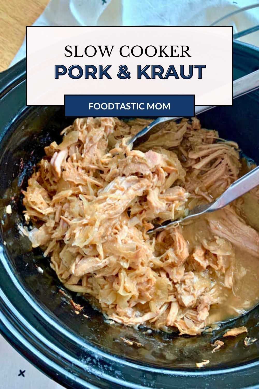 Fix this Slow Cooker Pork and Sauerkraut on New Year's Day to ensure good luck in the coming year. As a pig roots forward, so will you! via @foodtasticmom