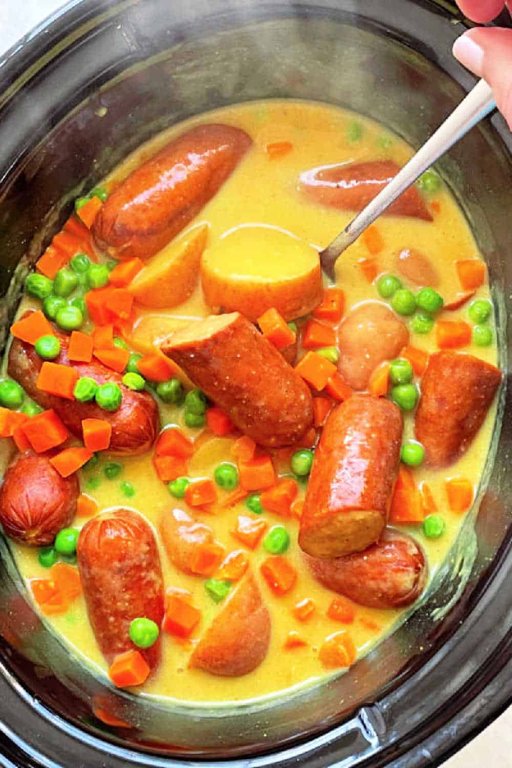This recipe for Slow Cooker Curried Sausage uses an innovative method to thicken its luscious and super simple curry sauce. via @foodtasticmom