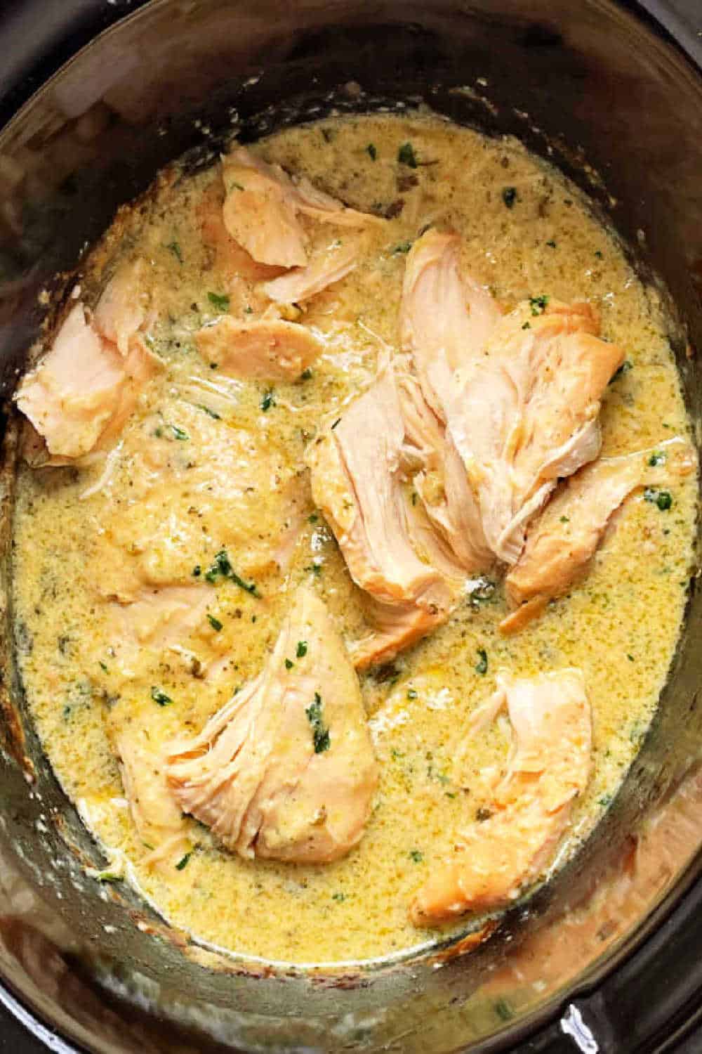 Crock pot creamy ranch chicken is a family pleasing meal with just a few simple ingredients, ready to serve over pasta or rice. via @foodtasticmom