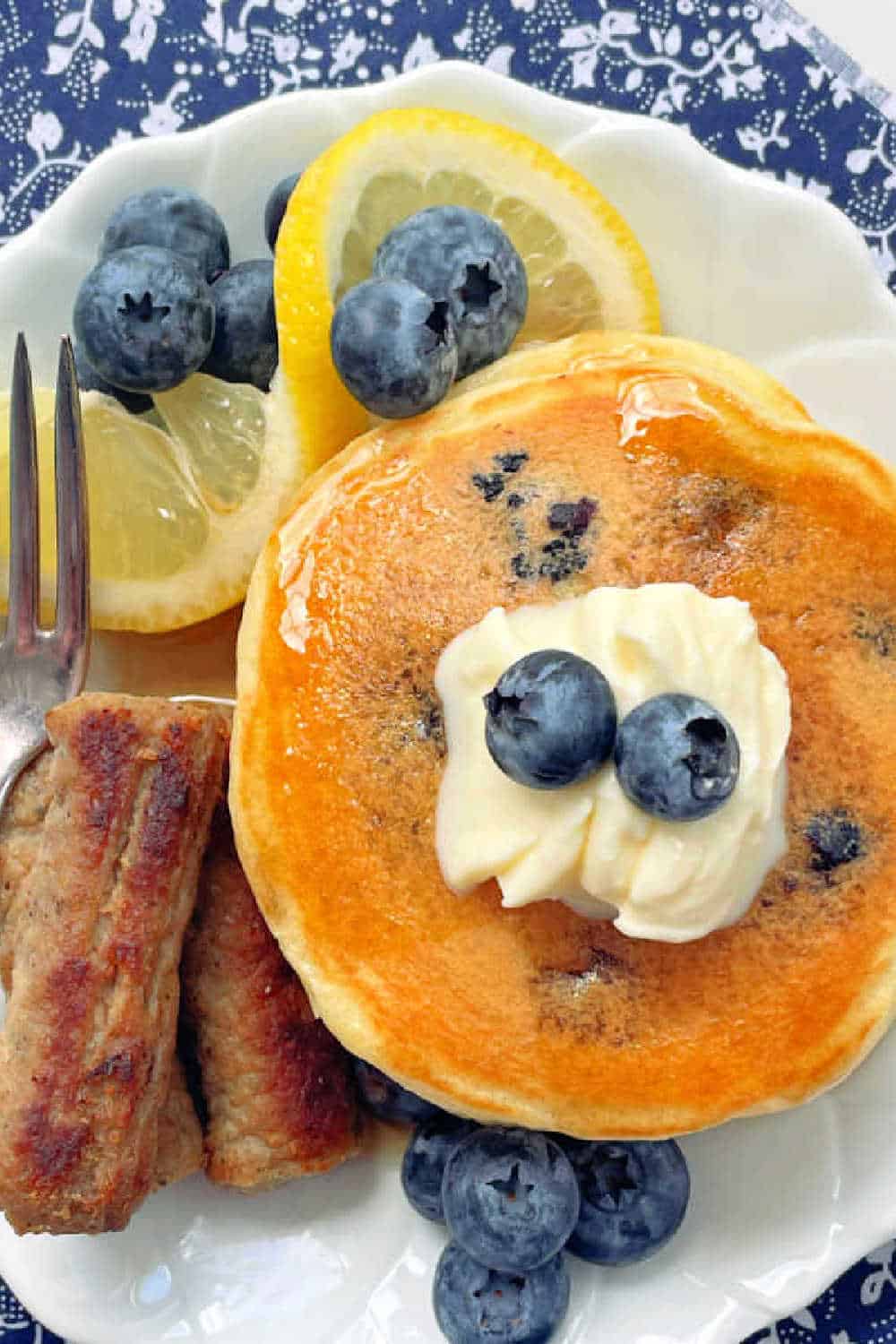 Lemon Blueberry Pancakes are fluffy and bursting with flavor thanks to real buttermilk, lemon zest and fresh blueberries. via @foodtasticmom