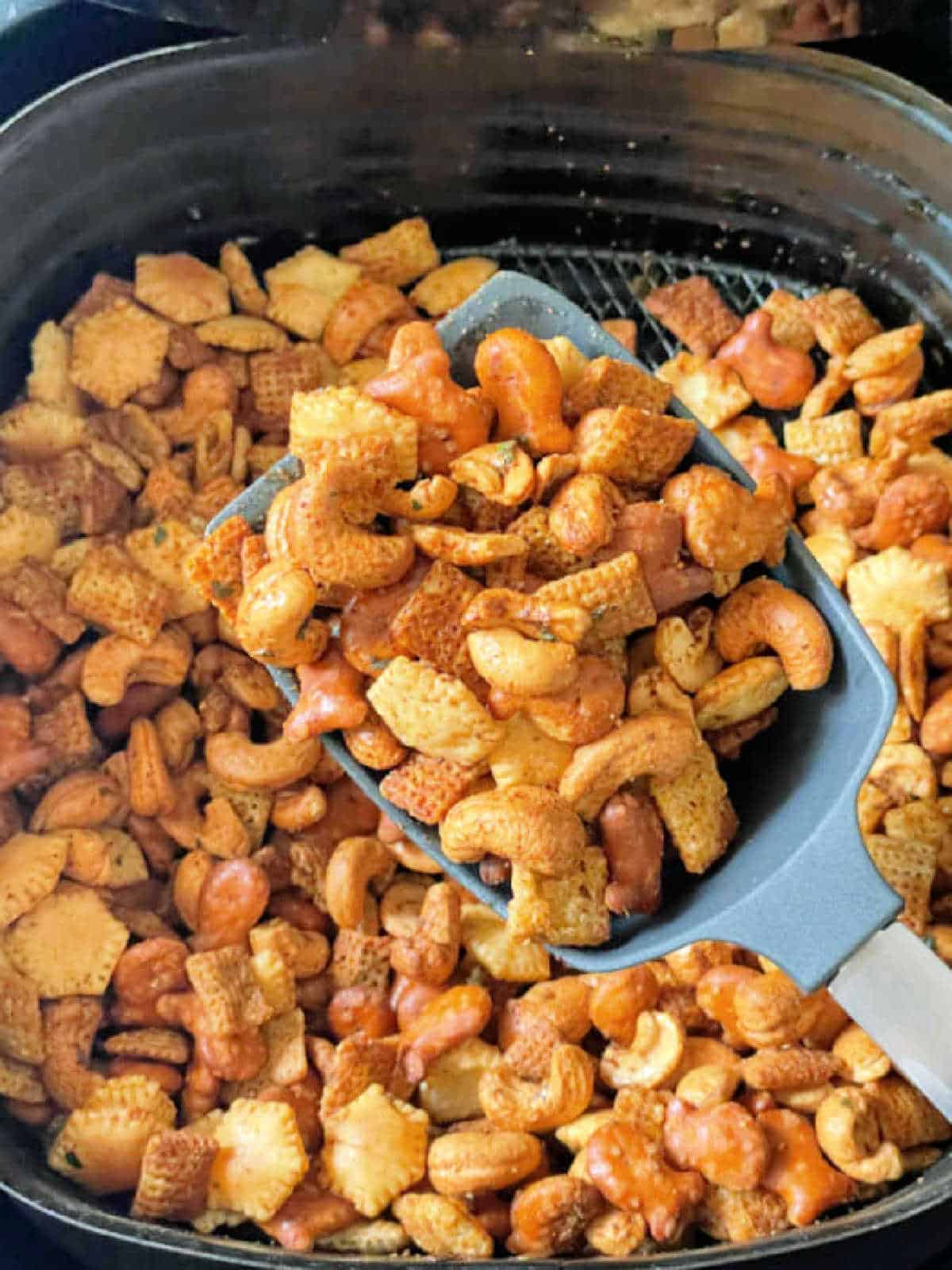 toasted Chex mix in air fryer basket