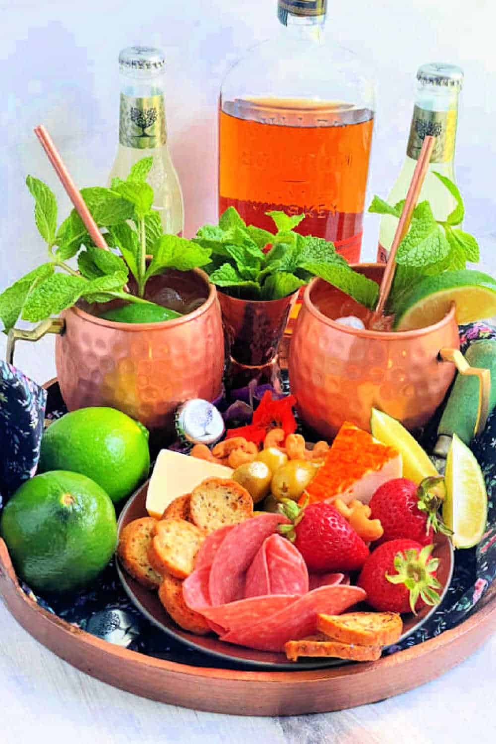 A Bourbon Mule is a cold and refreshing classic cocktail. It's made with Kentucky bourbon, ginger beer and fresh lime juice. via @foodtasticmom