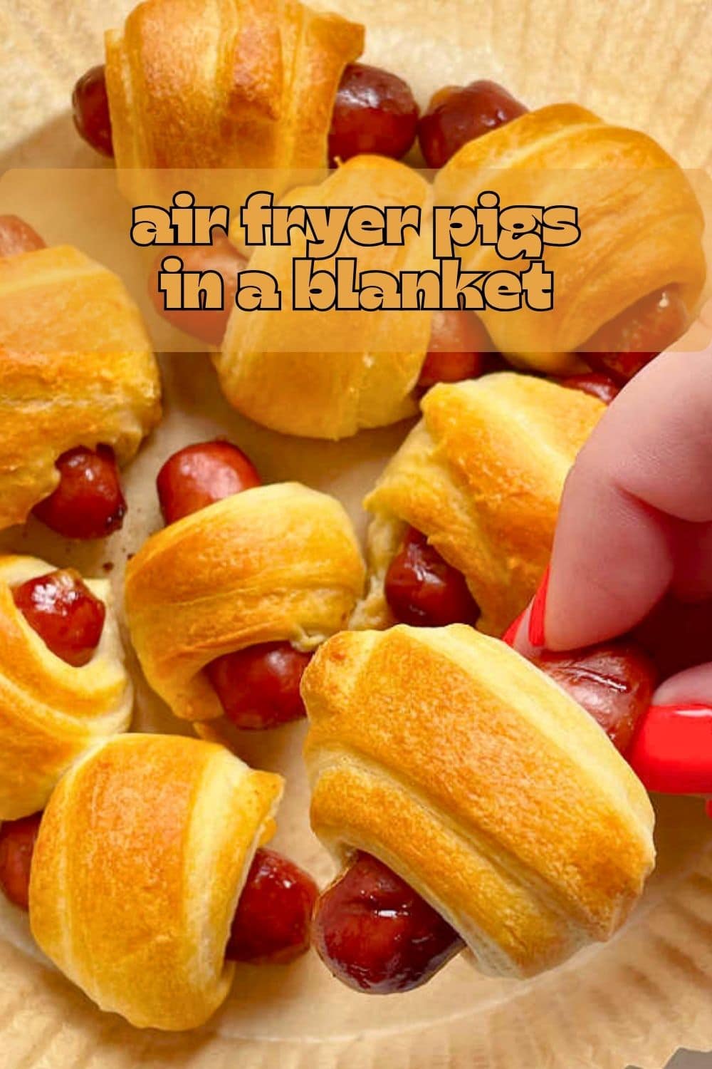 Air Fryer Pigs in a Blanket made with little smokies and crescent dough are a simple snack recipe for game days or an after school snack. via @foodtasticmom