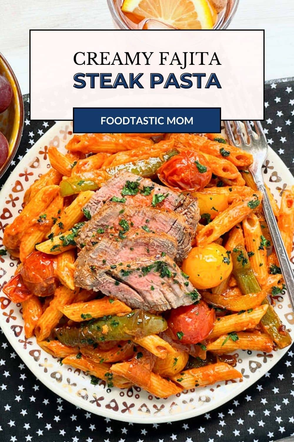 This steak pasta features perfectly cooked, Fajita-style steak on a bed of creamy penne pasta mixed with bell pepper, onions and burst cherry tomatoes. via @foodtasticmom