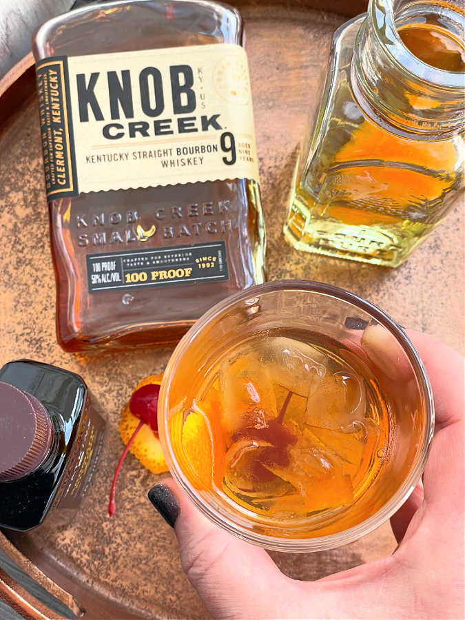 showing how to make an old fashioned at home