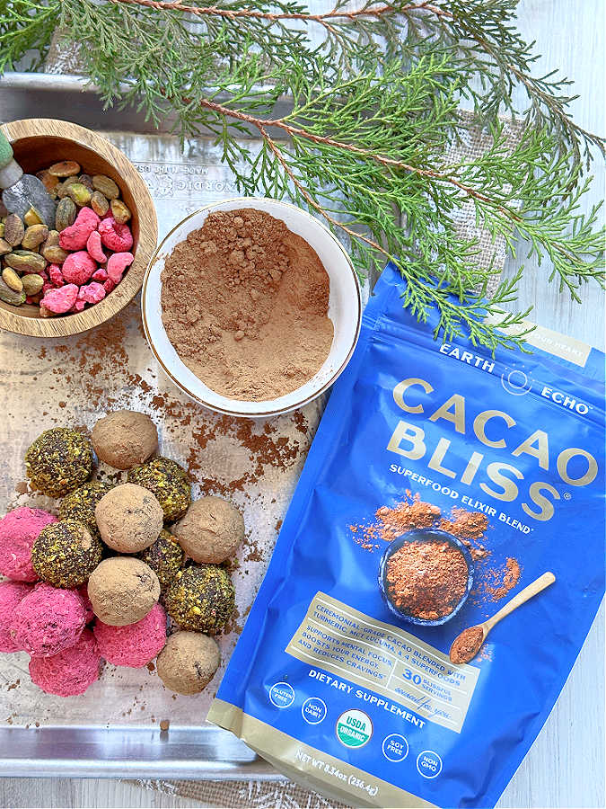 healthy chocolate truffles pictured with a package of the Earth Echo Foods Cacao Bliss