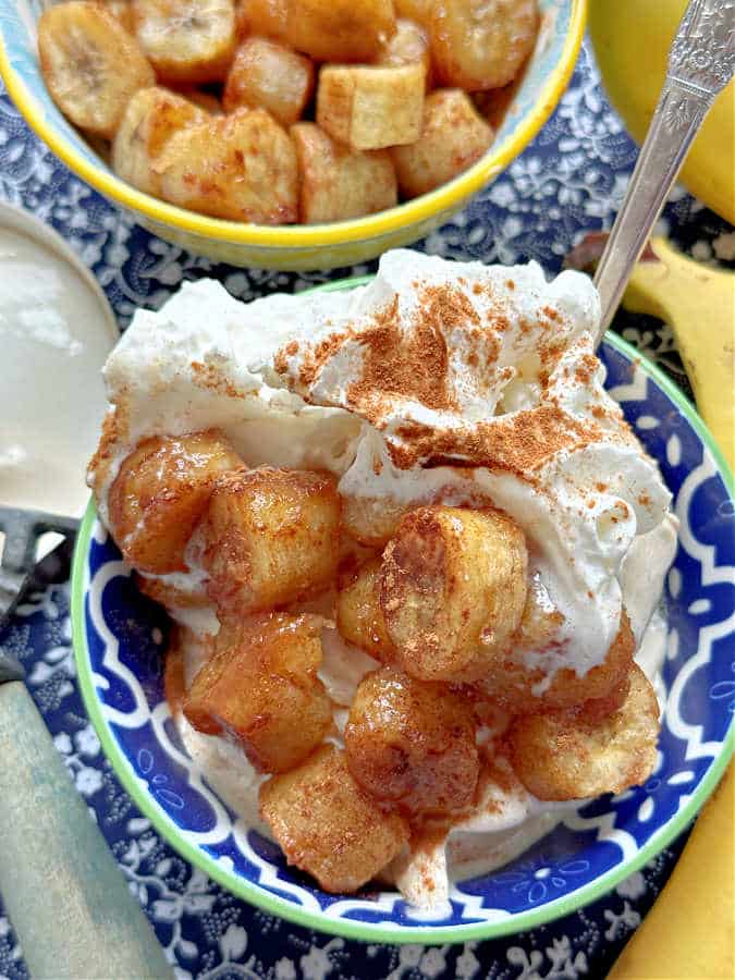 air fryer banana sundae with salted caramel ice cream and whipped cream