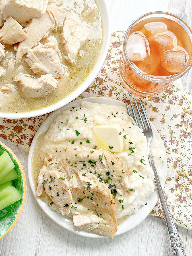 crock pot frozen turkey breast plated with mashed potatoes and gravy