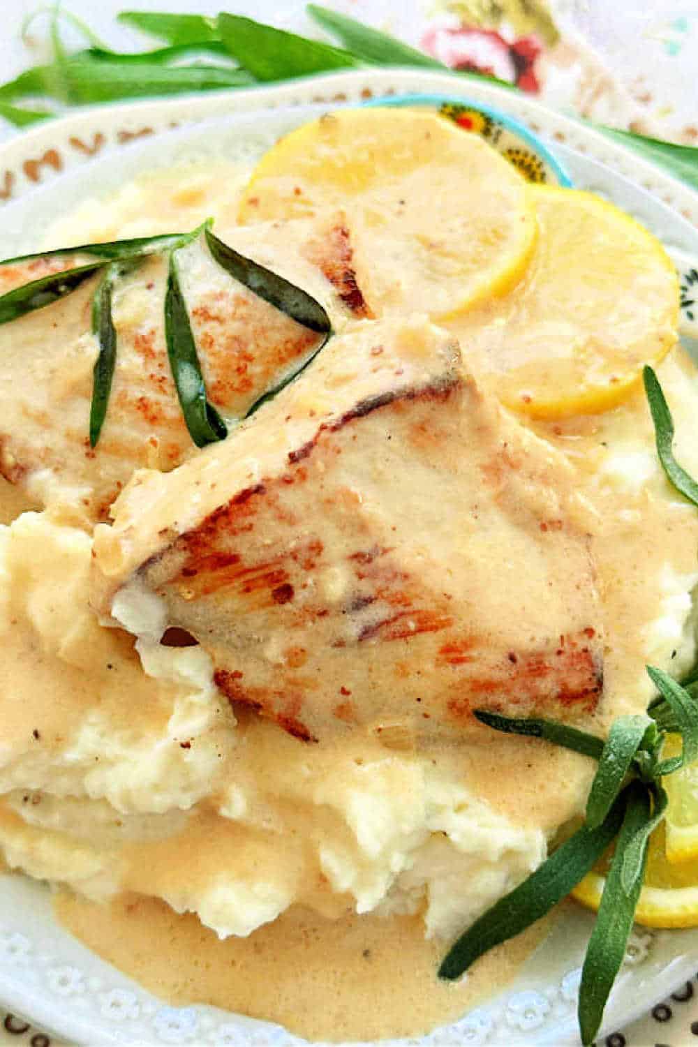 This beautiful tarragon chicken recipe has a creamy sauce which includes fresh tarragon, white wine, lemon, cream and Dijon mustard. via @foodtasticmom