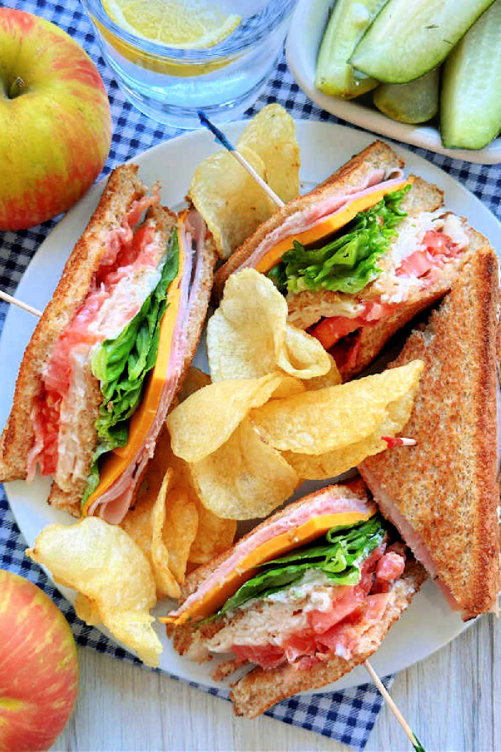 A classic club sandwich recipe with easy step by step instructions. Tarragon mayonnaise and buttery toast make this club sandwich the best. via @foodtasticmom