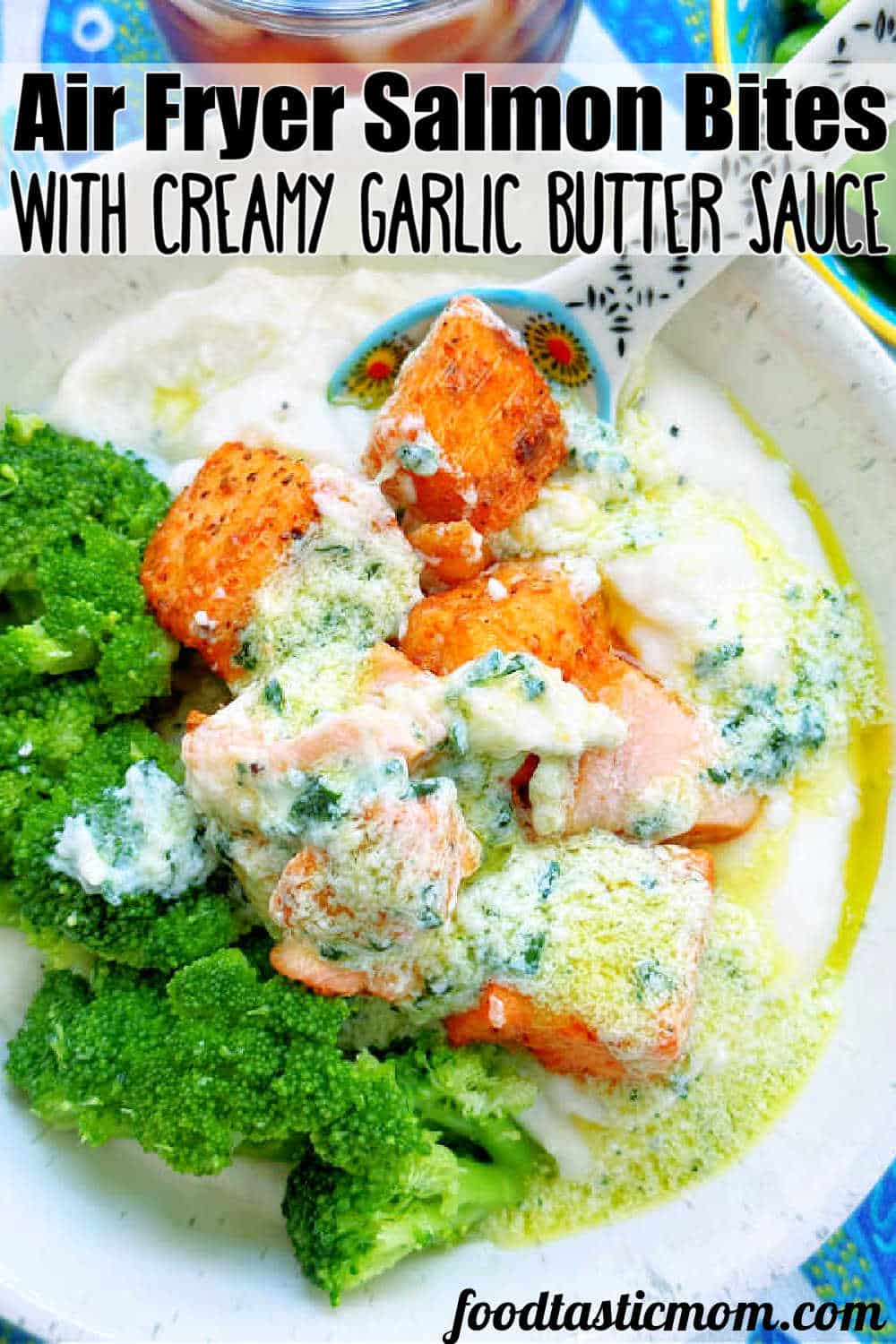 Tender air fryer salmon bites are seasoned with a simple spice rub and cook in just six minutes. Then drizzle them with your choice of sauce. via @foodtasticmom