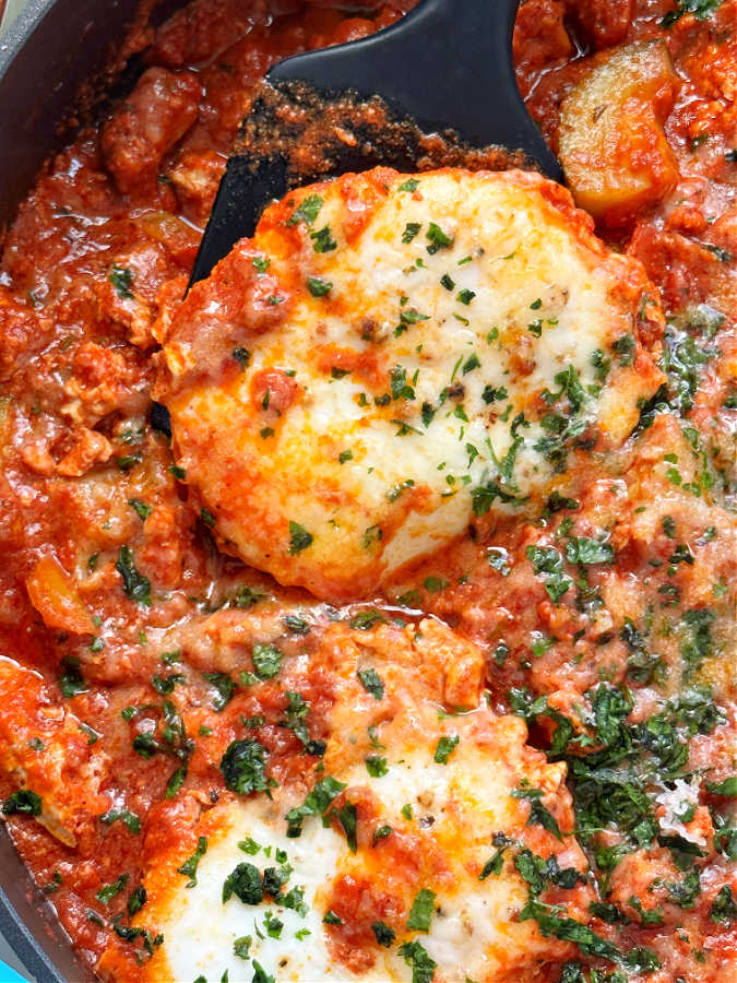 serving a perfectly cooked Spanish egg from the fry pan