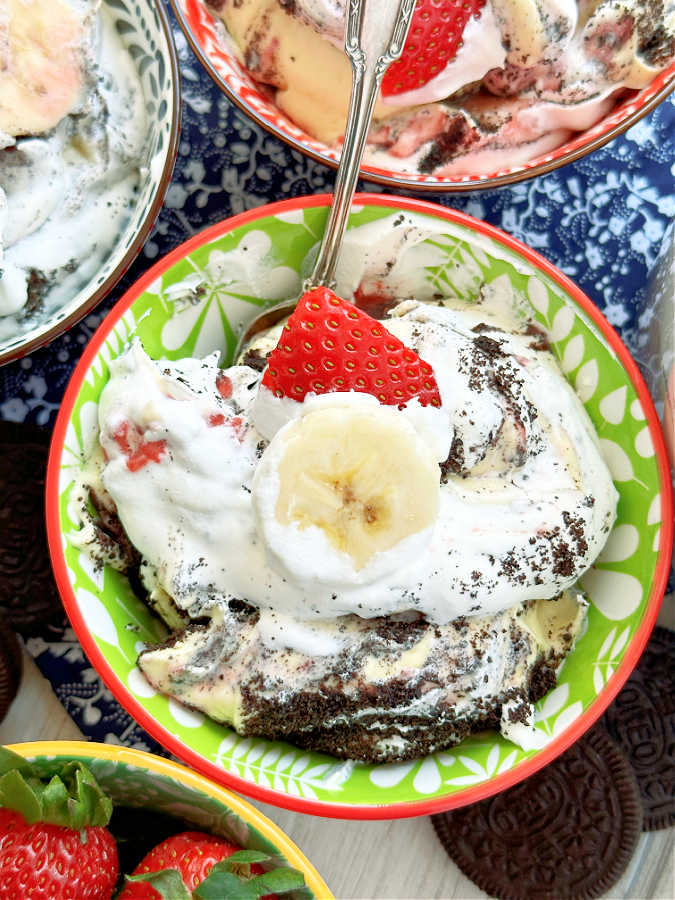 top view of a bowl of strawberry banana pudding, ready to eat